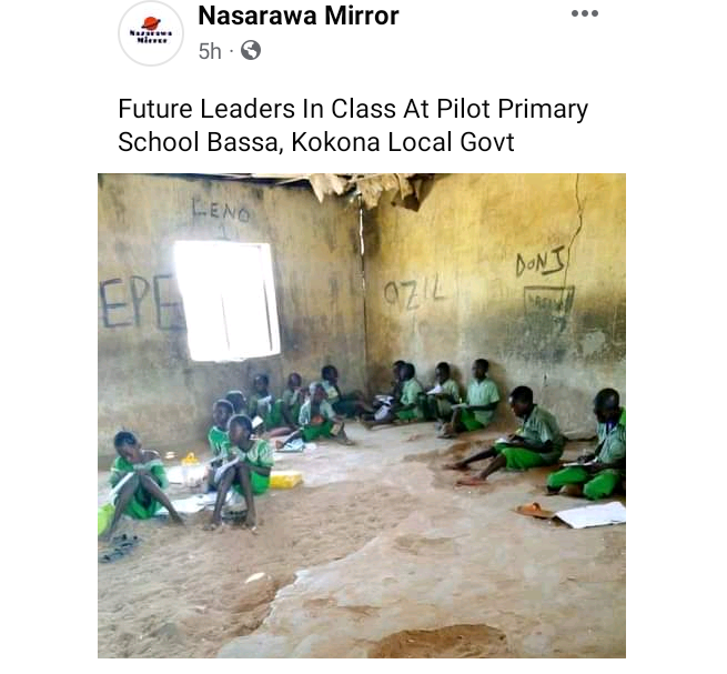 School children seen sitting on the bare floor of a shabby classroom in Nasarawa