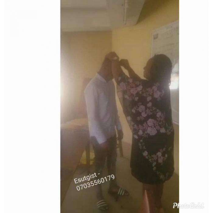 Another ESUT Lecturer Seen Shaving a Student Hair with a Razor Blade.