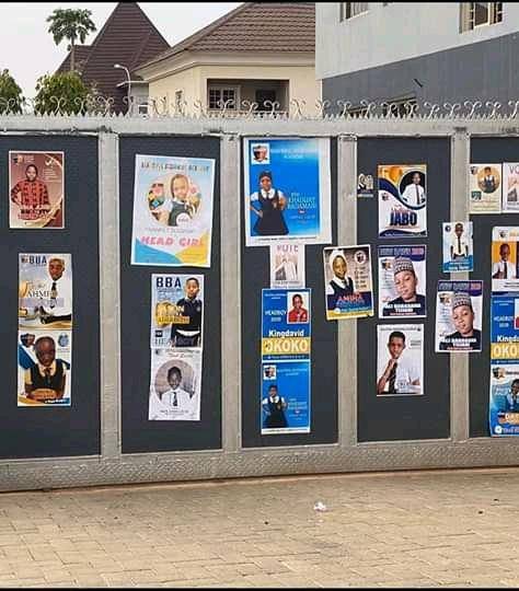 Abuja Primary School Pupil Print Posters To Vie For Head Boy and Head Girl Position.